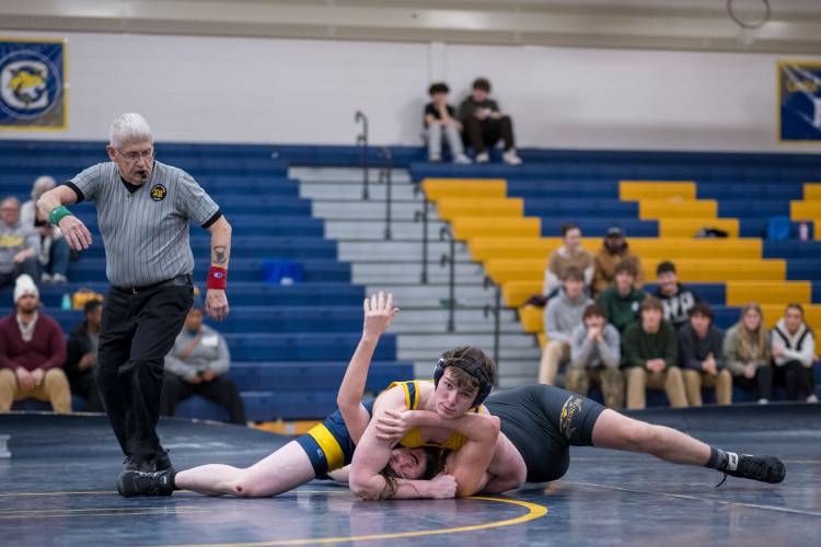 ConVal’s Solomon Page stays in control of his Souhegan opponent before winning by pin. 