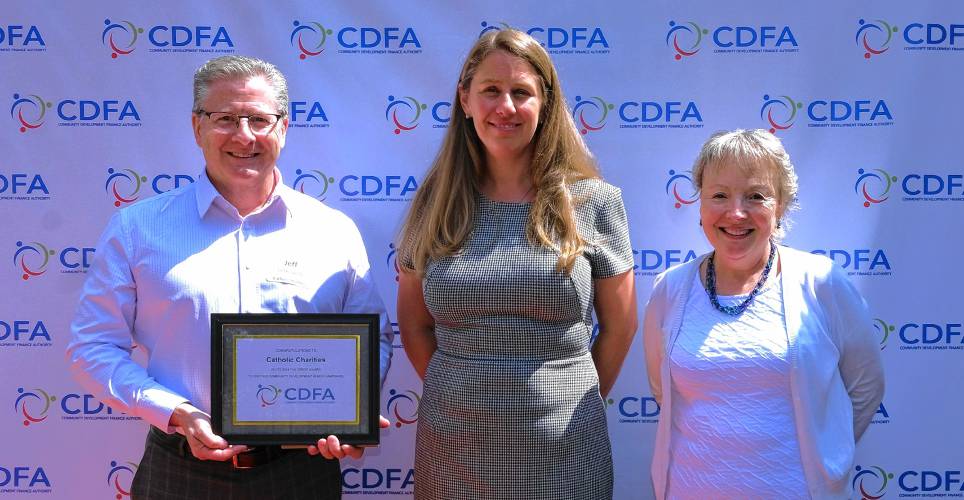 From left, Jeff Lefkovich, executive director of real estate services for Catholic Charities NH; Katherine Easterly Martey, executive director of New Hampshire Community Development Finance Authority; and Karen Moynihan, vice president of philanthropy for Catholic Charities NH.