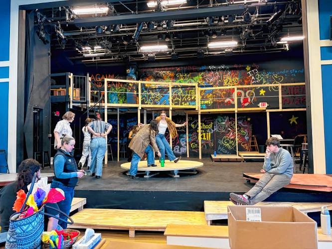 The cast of “Hadestown” tries out the rotating stage. 
