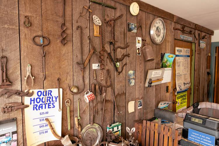 A wall decorated with items collected by Joe MacGregor. 