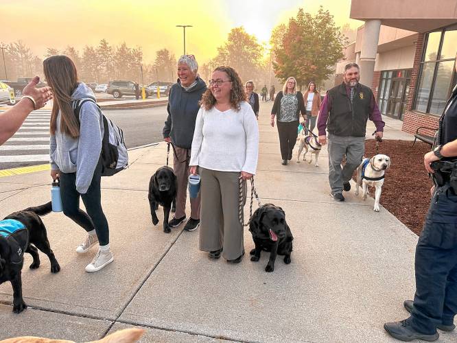 A team of handlers and comfort therapy dogs from Cold Springs Healing Paws in New Ipswich respond to the ConVal Regional High School Monday to provide comfort to students impacted by crashes that killed a current ConVal student and a recent student, and injured other students on Friday and Saturday.