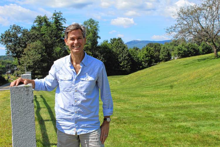 Author Andrew Krivak of Jaffrey stands before a view of Mount Monadnock, which was an inspiration for the setting of his novel, 